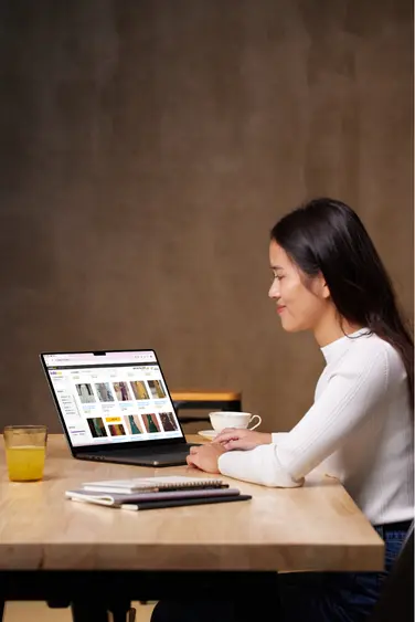 woman browsing shopping site happily