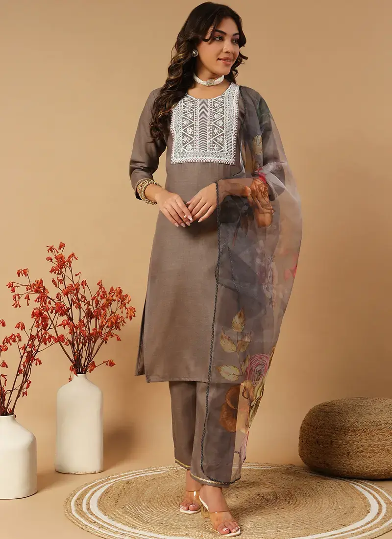 A-line salwar kameez in pastel tones styled with narrow pants for a chic day look